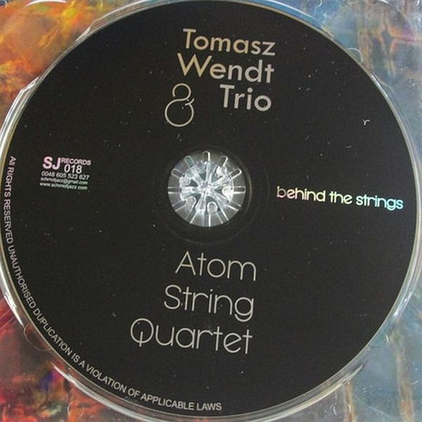 https://www.discogs.com/release/10031752-Tomasz-Wendt-Trio-Atom-String-Quartet-Behind-The-Strings