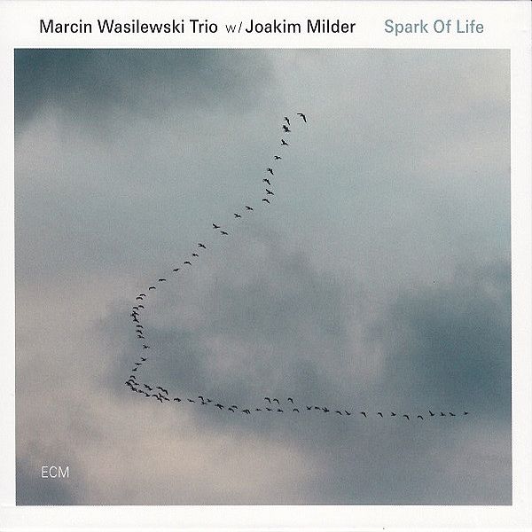 https://www.discogs.com/release/6175510-Marcin-Wasilewski-Trio-W-Joakim-Milder-Spark-Of-Life